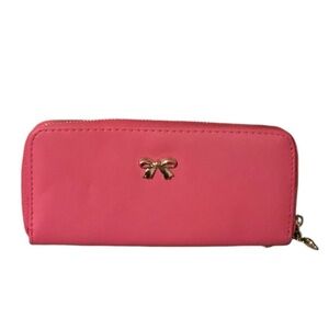 Pink wallet faux leather billfold zip up with gold bow.